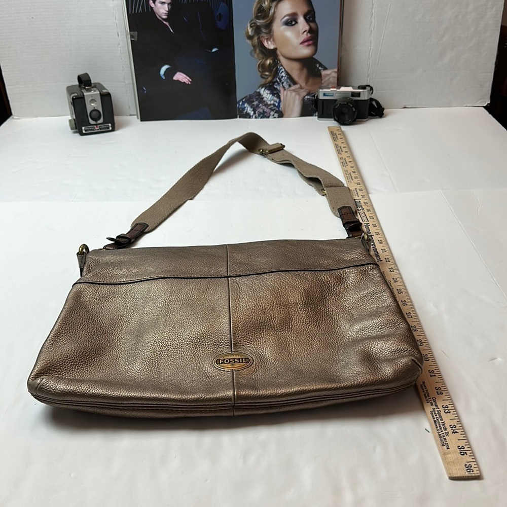 Fossil Metallic Brown Genuine leather Explorer Foldover Tote/ messenger bag.